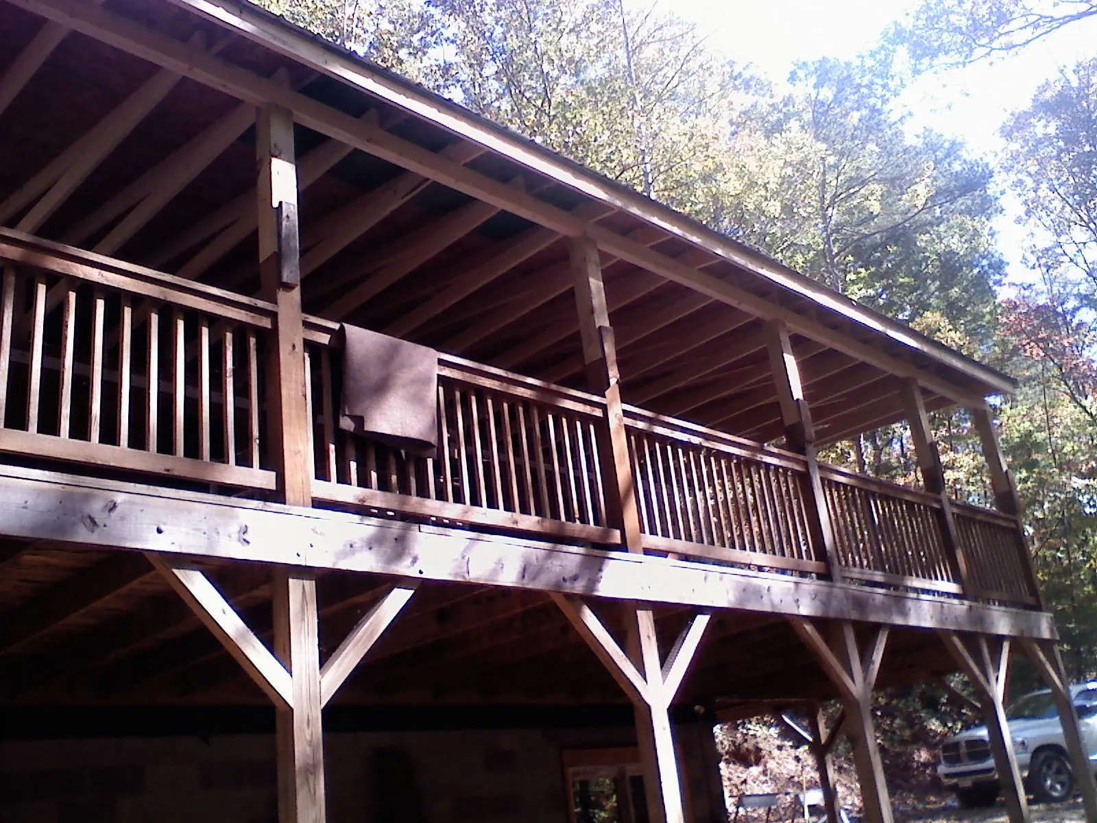 Timber framing under a new elevated porch and deck — Roof Leak Repair in Perry by Roofing Brothers